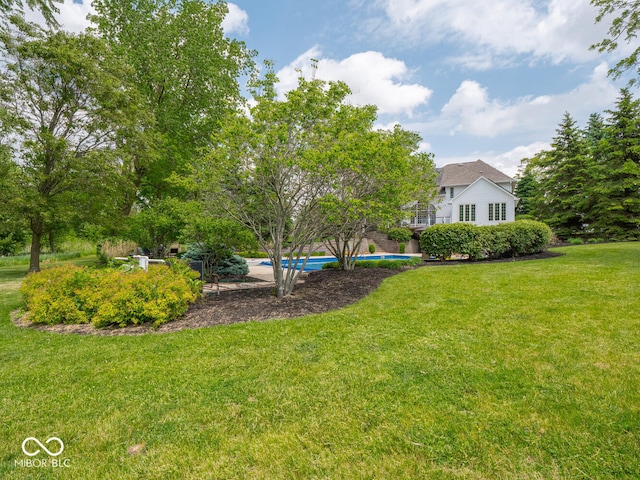 5784 N 600 E, Greenfield, IN 46140 - view of grassy yard featuring an outdoor pool