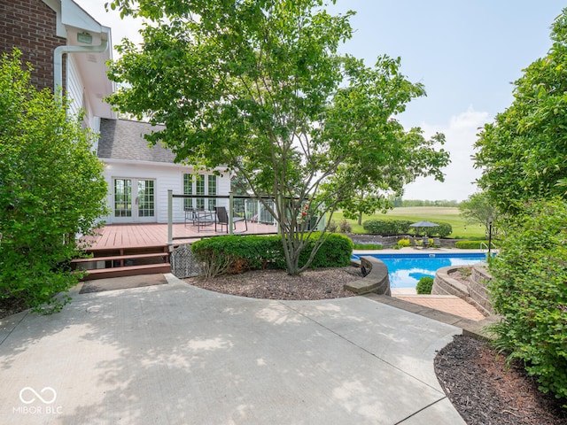 5784 N 600 E, Greenfield, IN 46140 - swimming pool with a wooden deck and french doors