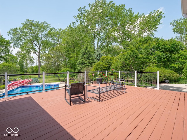 5784 N 600 E, Greenfield, IN 46140 - wooden deck featuring view of wooded area
