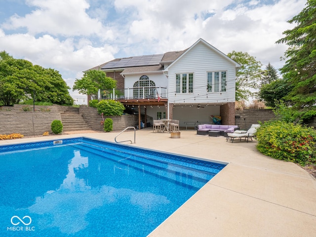 5784 N 600 E, Greenfield, IN 46140 - view of pool featuring an outdoor living space, stairs, a deck, a patio area, and ceiling fan