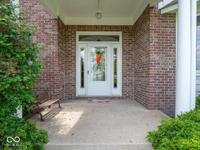 5784 N 600 E, Greenfield, IN 46140 - property entrance featuring brick siding
