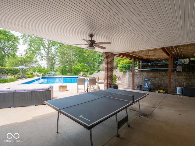 5784 N 600 E, Greenfield, IN 46140 - view of patio featuring a ceiling fan, an outdoor pool, and outdoor lounge area