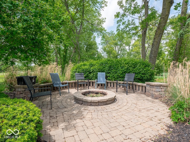 5784 N 600 E, Greenfield, IN 46140 - view of patio / terrace featuring a fire pit
