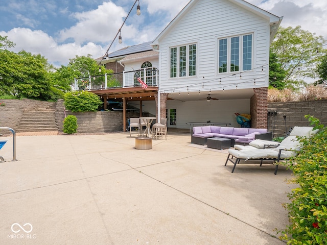 5784 N 600 E, Greenfield, IN 46140 - rear view of property featuring outdoor lounge area, a patio, and ceiling fan