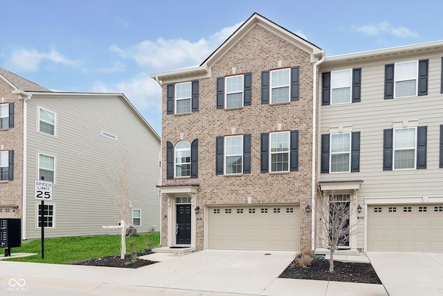 7282 Zanesville Rd, Carmel, IN 46033 - multi unit property featuring brick siding, driveway, and a garage
