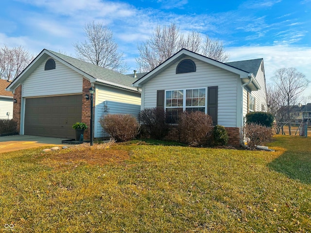 single story home featuring driveway, brick siding, an attached garage, and a front yard