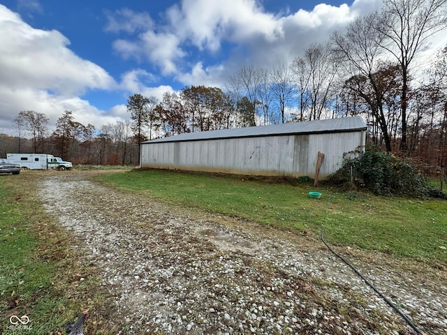 exterior space featuring an outbuilding