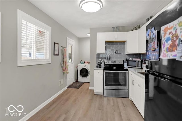 kitchen featuring white cabinetry, appliances with stainless steel finishes, tasteful backsplash, washer / clothes dryer, and light hardwood / wood-style flooring