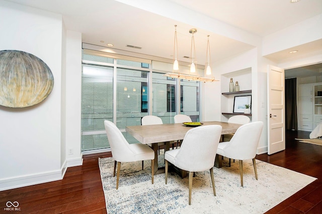 dining room featuring dark hardwood / wood-style floors