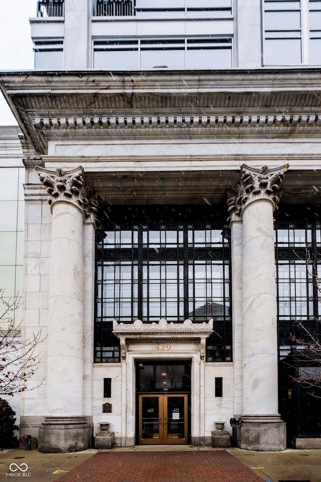 property entrance featuring french doors