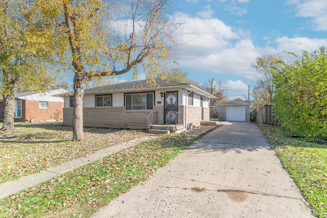 view of front of home with an outdoor structure and a garage