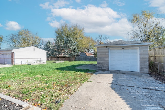 garage with a yard