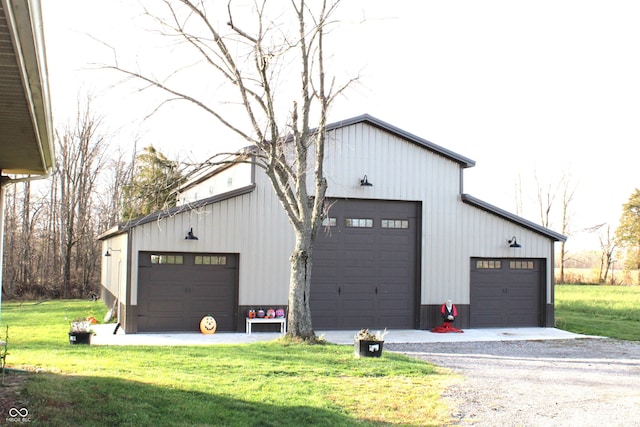 garage with a lawn