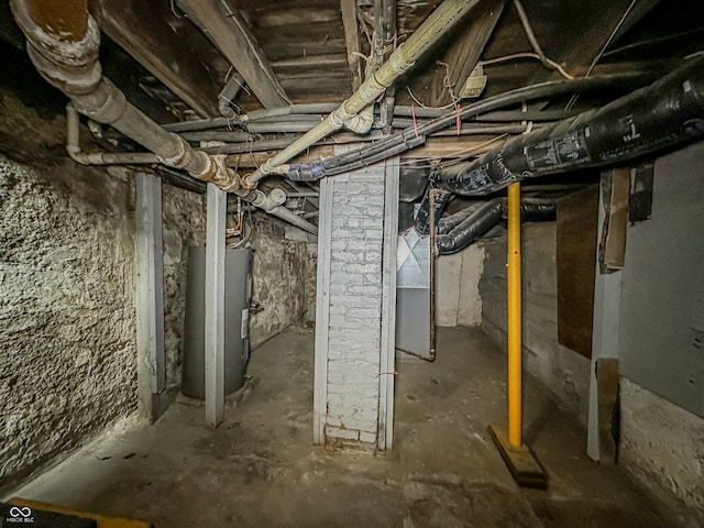 basement featuring electric water heater