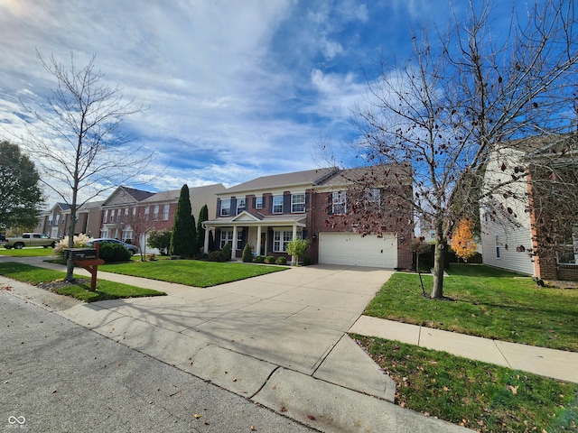 view of front facade with a garage and a front yard