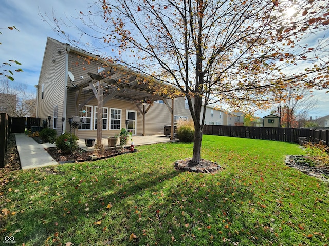 view of yard with a patio and a pergola