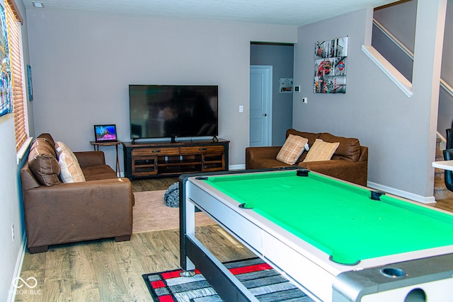 playroom with hardwood / wood-style flooring