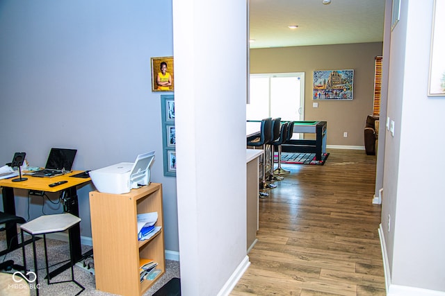 office with wood-type flooring