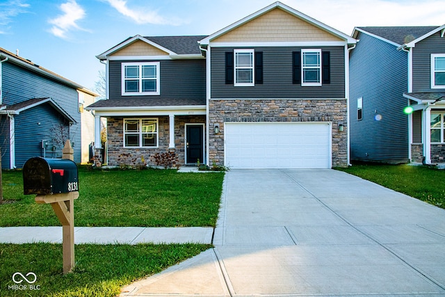 view of front of home with a garage and a front lawn