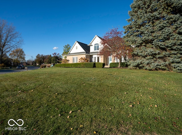 view of front of property with a front lawn