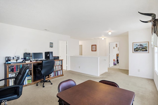 view of carpeted office space