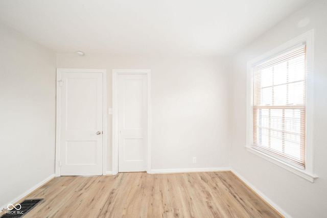 empty room featuring light hardwood / wood-style flooring