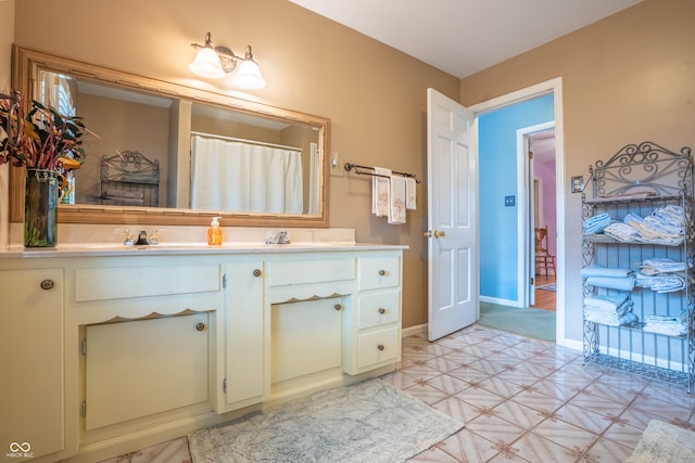 bathroom featuring vanity and a shower with curtain