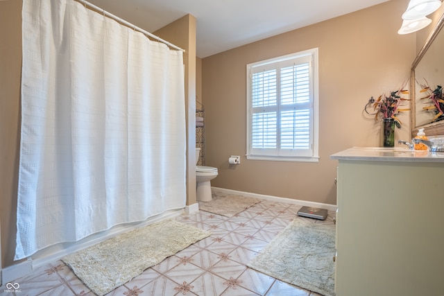 full bathroom featuring vanity, shower / bath combination with curtain, and toilet