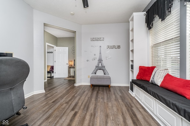 mudroom featuring ceiling fan, a textured ceiling, and dark hardwood / wood-style flooring