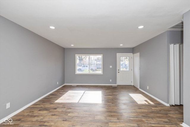 foyer entrance with dark wood-type flooring