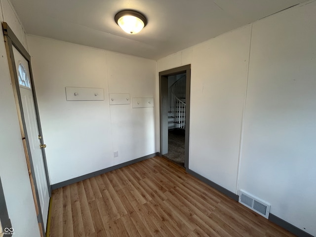 unfurnished bedroom with light hardwood / wood-style floors