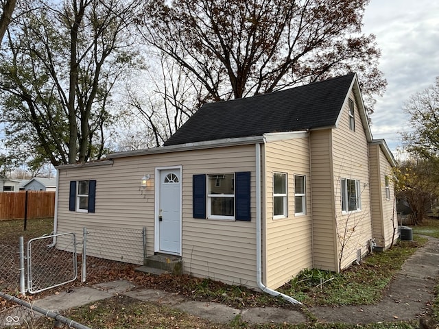 view of front of house featuring central air condition unit