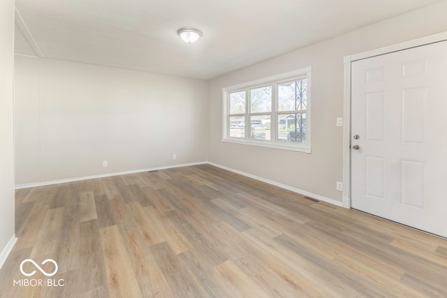 entrance foyer featuring light wood-type flooring