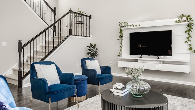 living room with dark hardwood / wood-style flooring