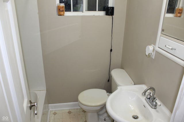 full bathroom with toilet, plus walk in shower, and sink