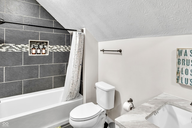 full bathroom featuring shower / bath combination with curtain, vanity, a textured ceiling, toilet, and lofted ceiling