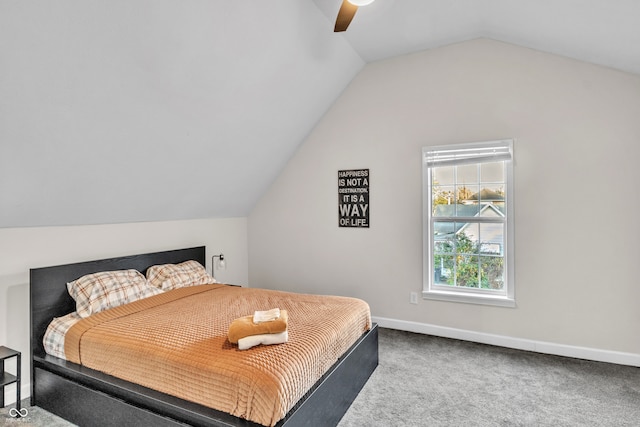 bedroom with carpet, ceiling fan, and lofted ceiling