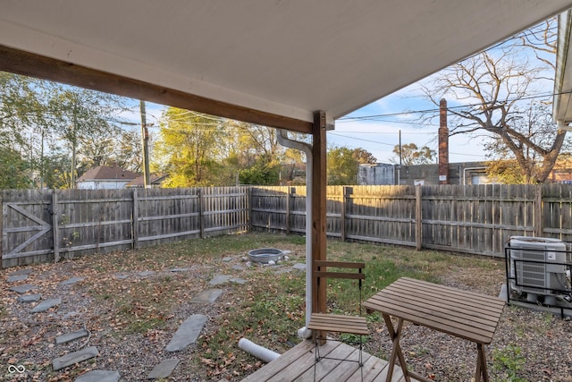 view of yard with an outdoor fire pit