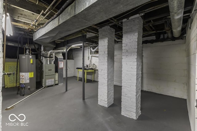 907 S E St, Indianapolis, IN 46225 - unfinished below grade area with gas water heater and heating unit