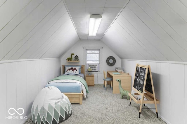 bedroom featuring carpet and lofted ceiling