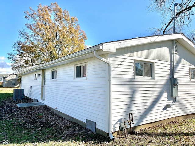 view of side of home with cooling unit