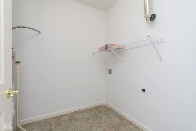 clothes washing area featuring hookup for an electric dryer and hookup for a washing machine