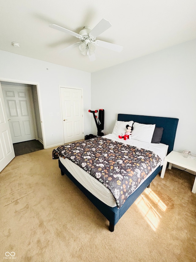 bedroom featuring carpet flooring and ceiling fan