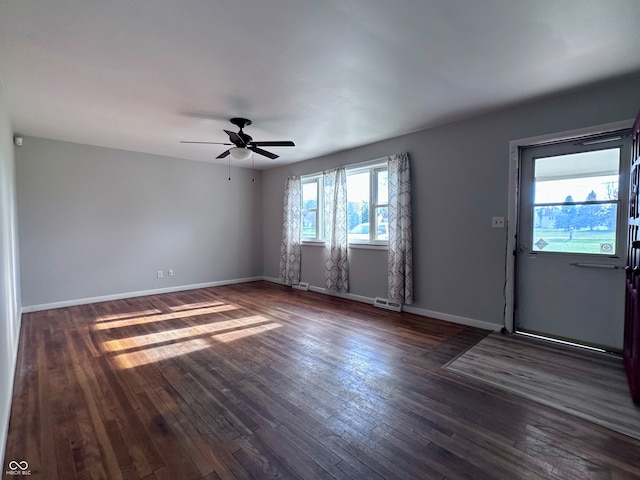 entrance foyer with dark wood-type flooring and ceiling fan