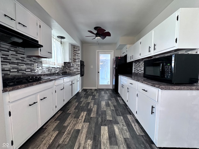 kitchen with extractor fan, black appliances, dark hardwood / wood-style floors, ceiling fan, and white cabinets