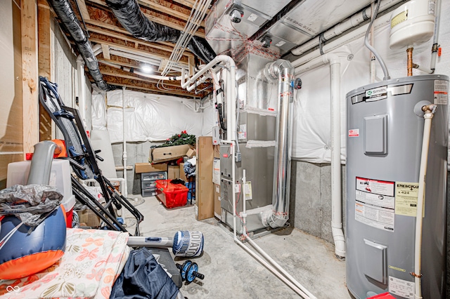 basement with electric water heater and heating unit