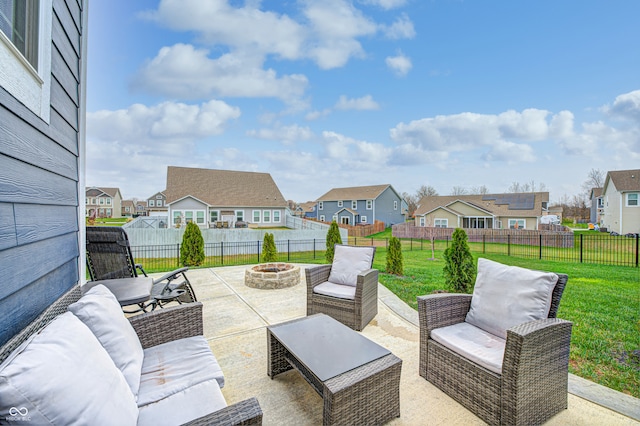 view of patio / terrace with an outdoor living space with a fire pit