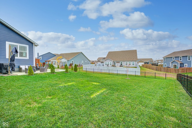 view of yard with outdoor lounge area and a patio