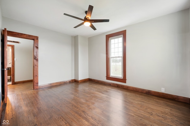unfurnished room with hardwood / wood-style floors and ceiling fan