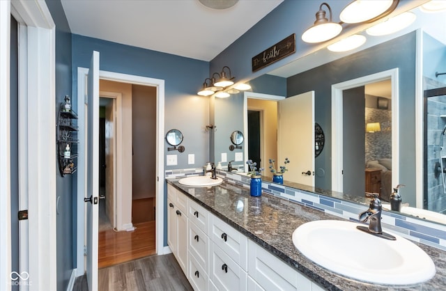 bathroom featuring vanity and wood-type flooring